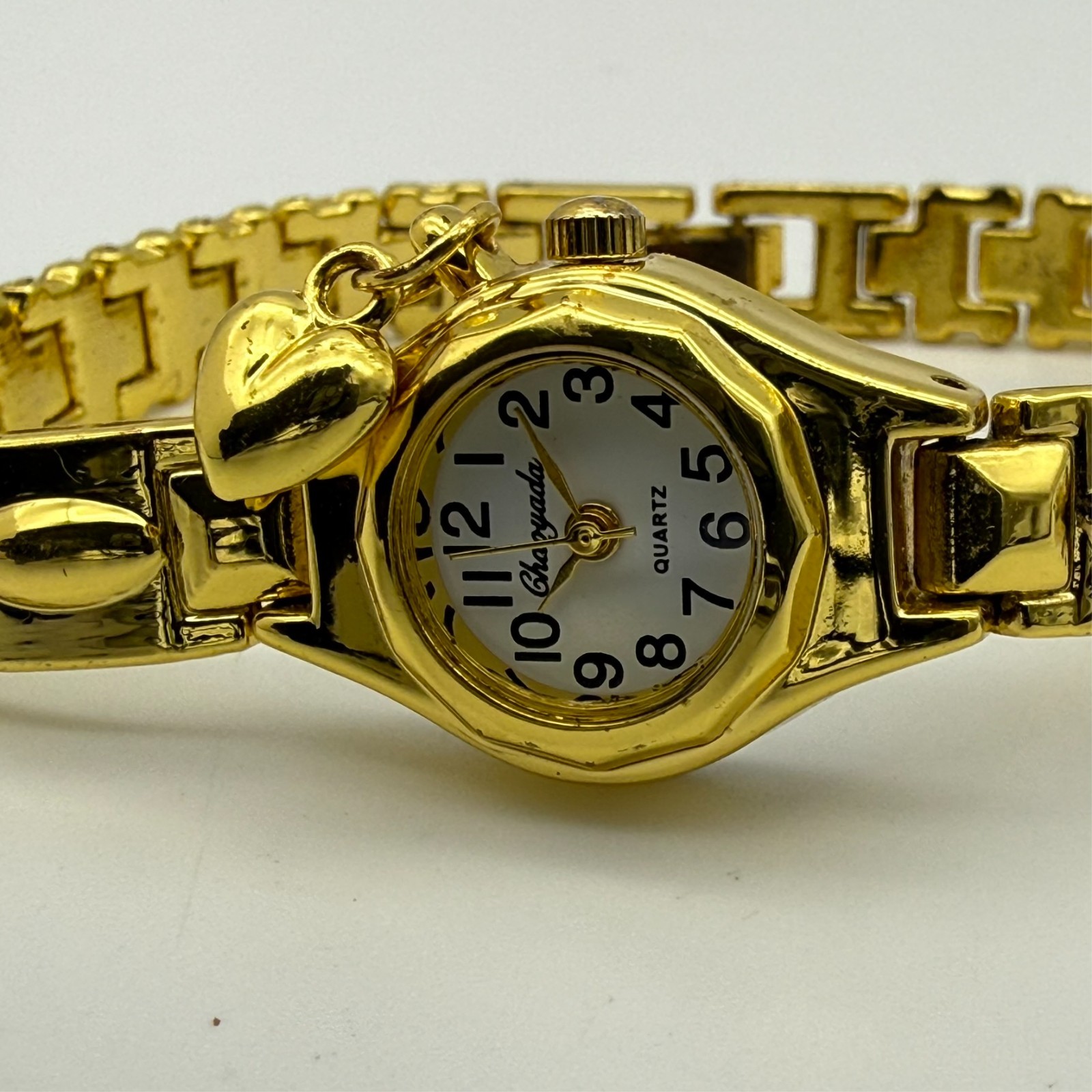 Women’s Gold Tone Classic Petite Bracelet Watch, White Dial, Runs, Heart Charm