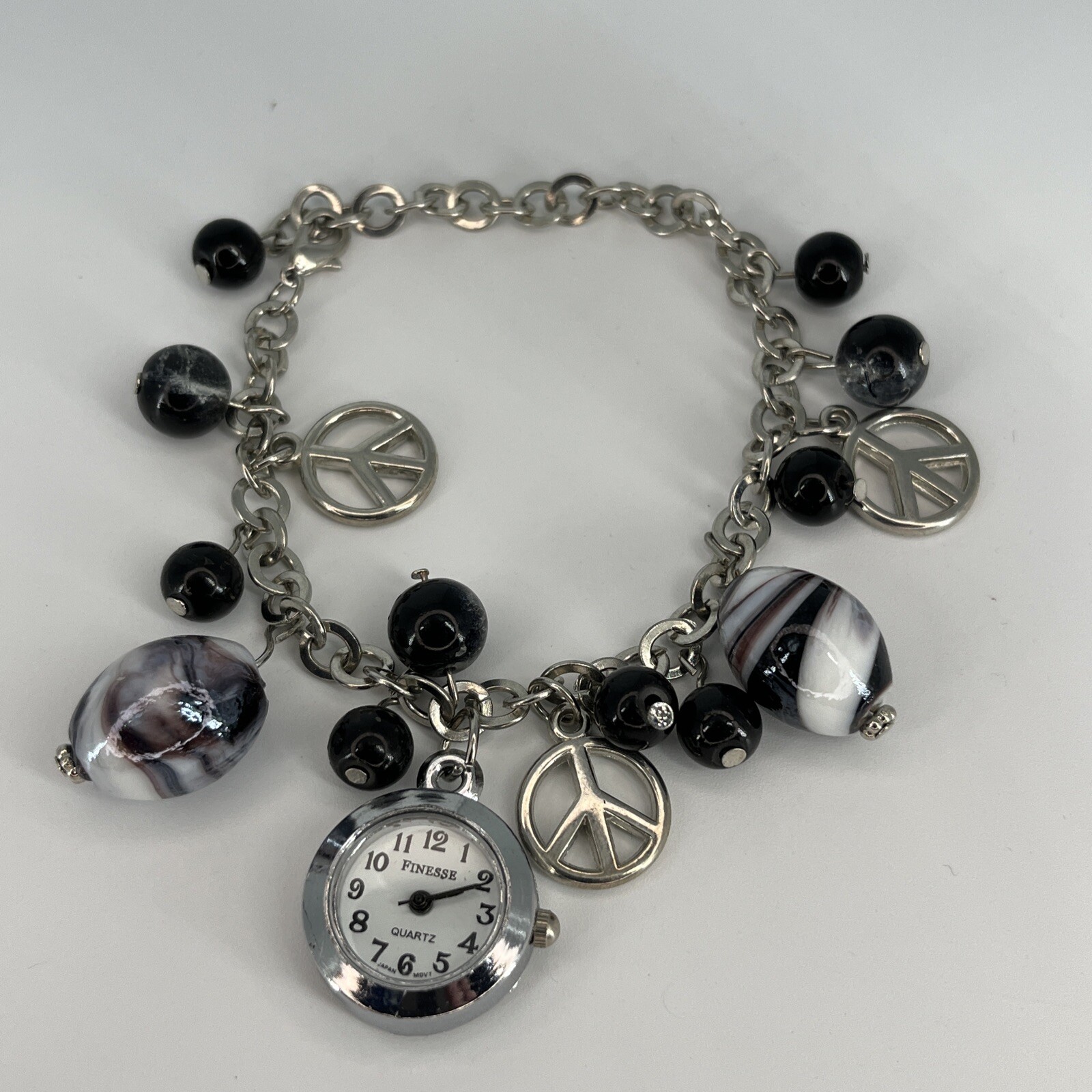 FINESSE Peace Women’s Watch Charm Bracelet Watch Silver Tone NEW BATTERY RUNS!