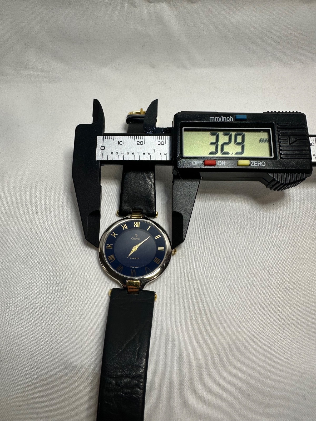 VINTAGE CHEVAL QUARTZ GOLD TONE CASE BLACK STRAP