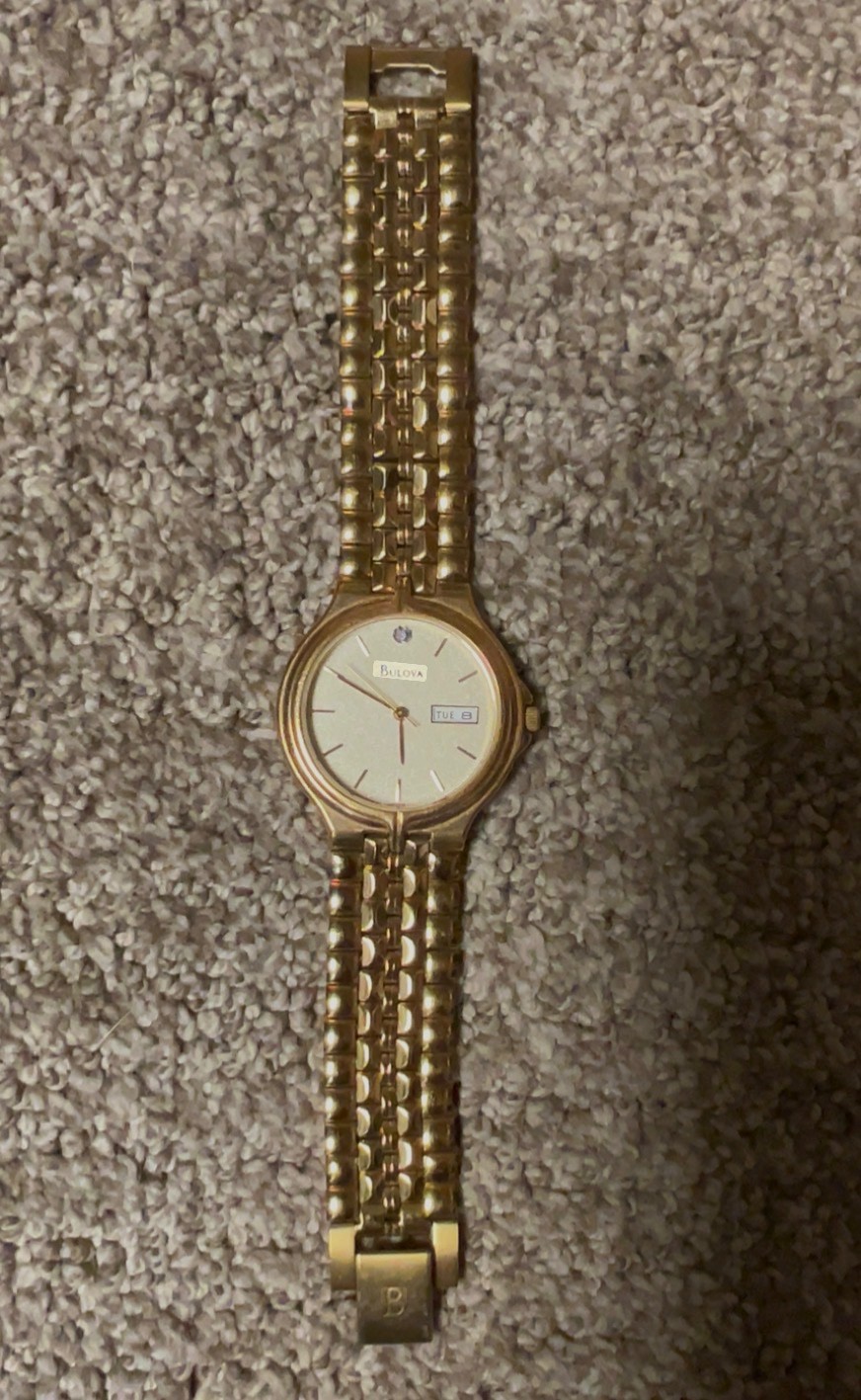vintage Bulova 97D29 men’s watch featuring a yellow gold-tone stainless steel