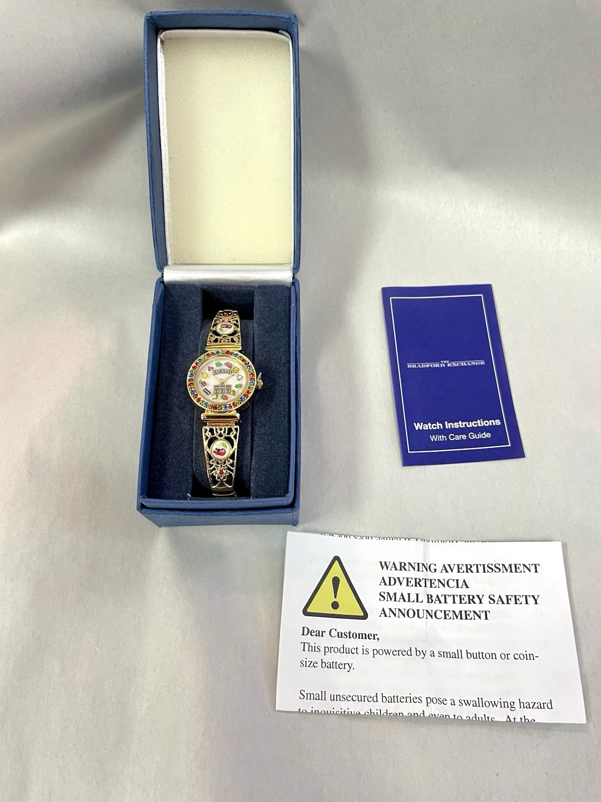 BRADFORD EXCHANGE HIT THE JACKPOT WOMANS WATCH GOLD TONE CASINO