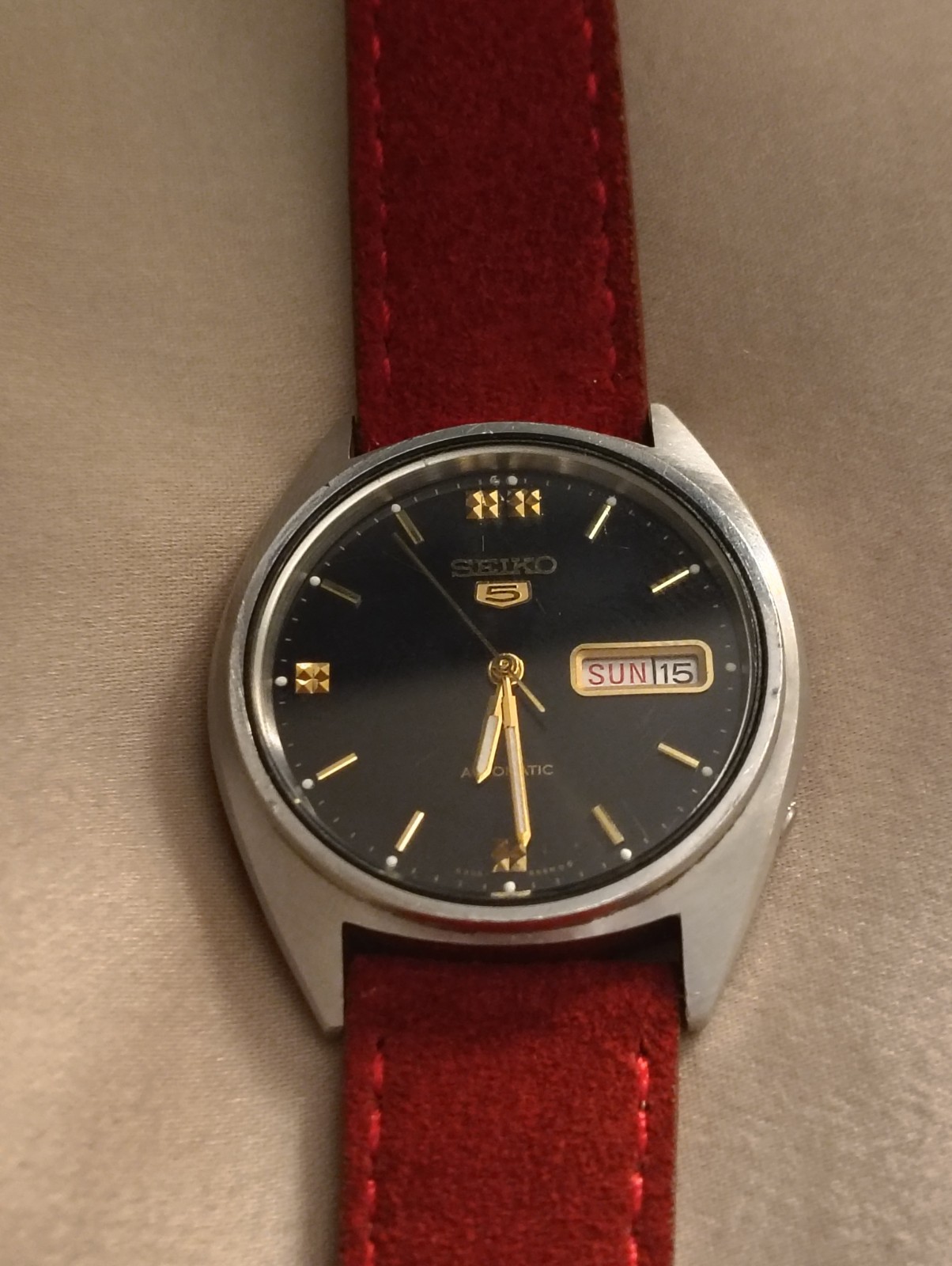 Seiko 5 Automatic Men’s 36-39mm Black Dial Stick Day/Date Red Leather Watch