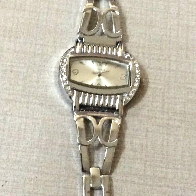 Finesse Women’s Watch Rectangle Crystal Bezel Silver Dial on a Silver Link Band!