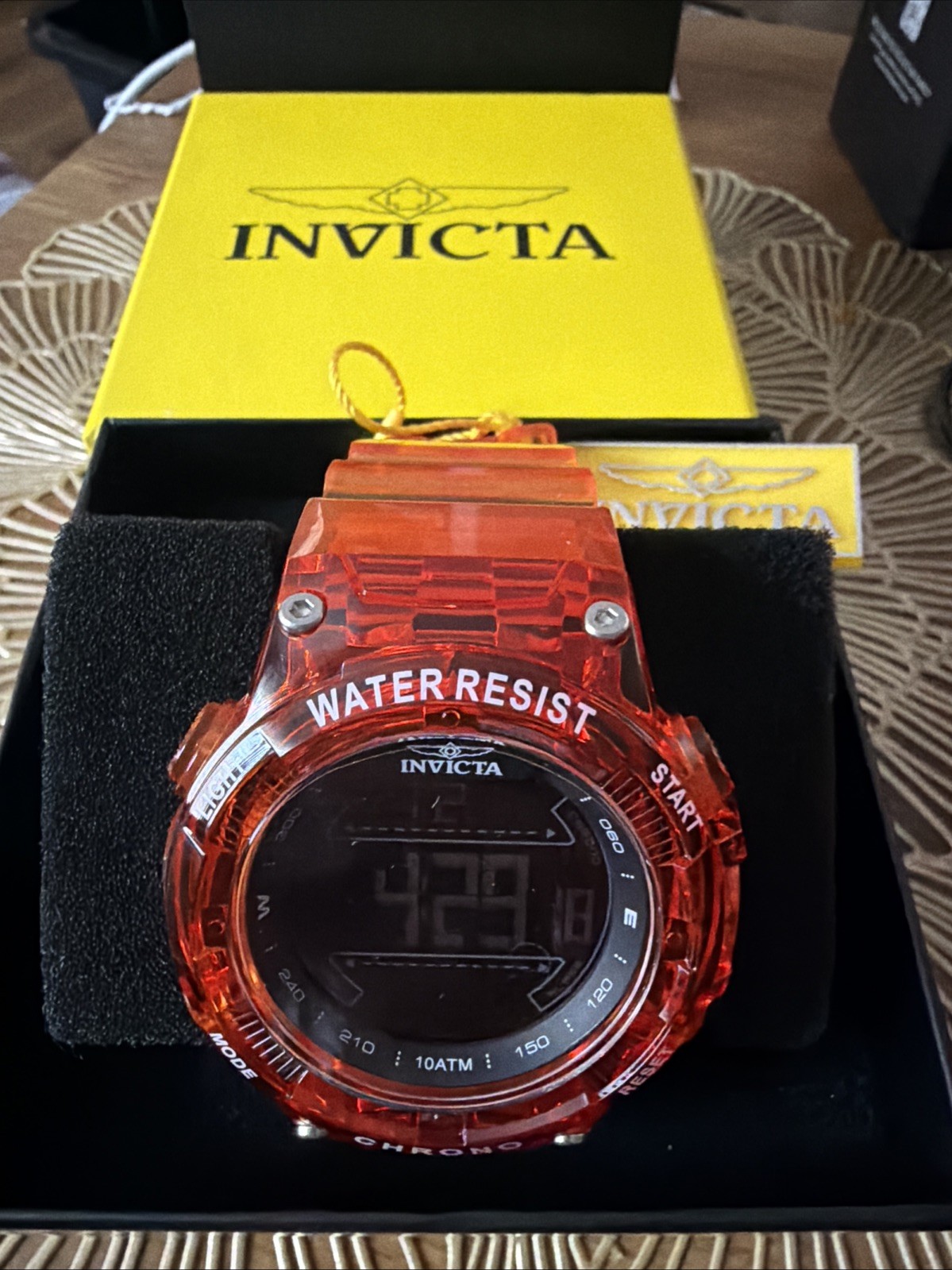 49046 – Invicta Racing Burnout Digital Men’s Watch – 52mm, Transp Org – Men’s