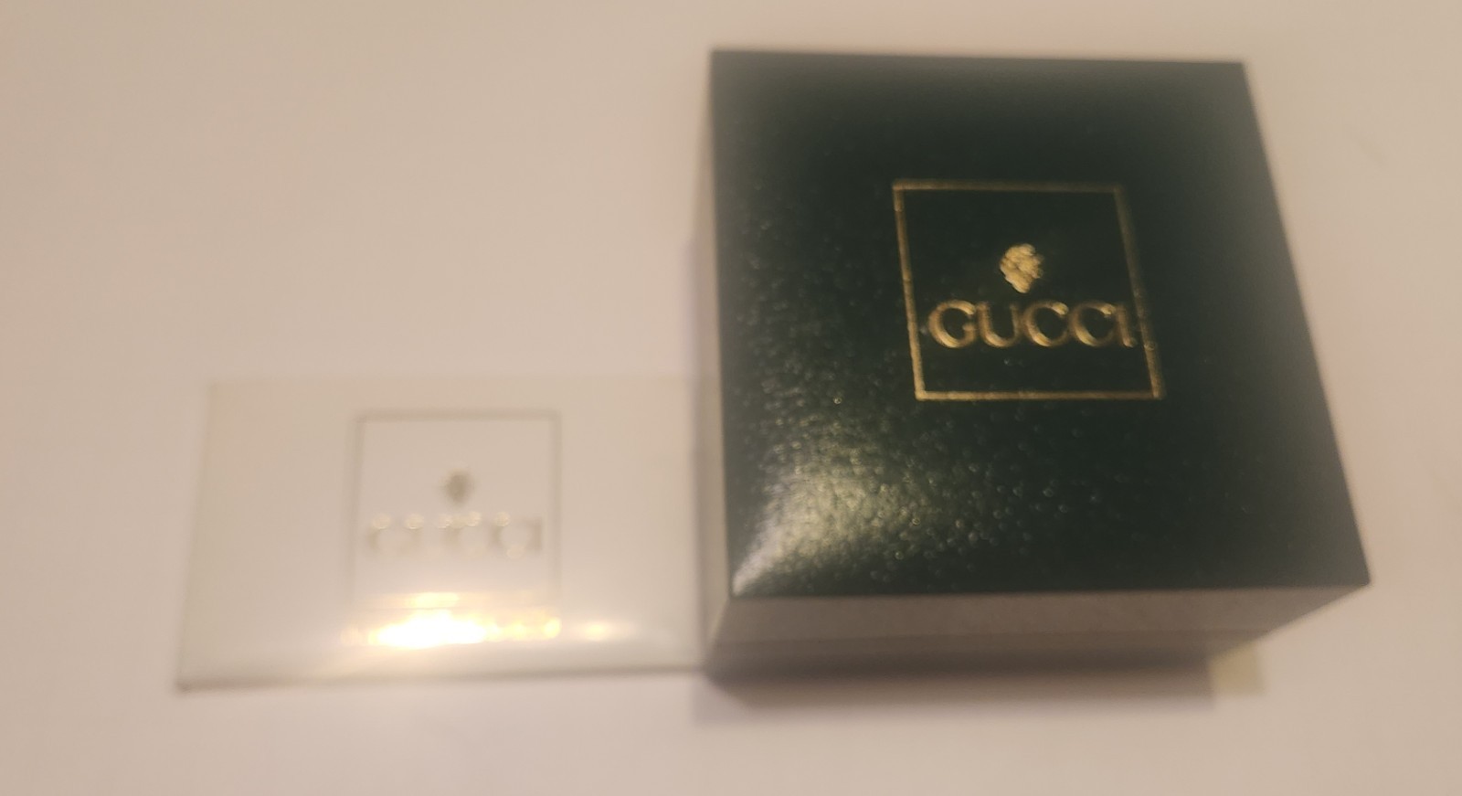 Gucci 1100 Series Interchangeable Bezel Watch (referred to as the Gucci 11/12)