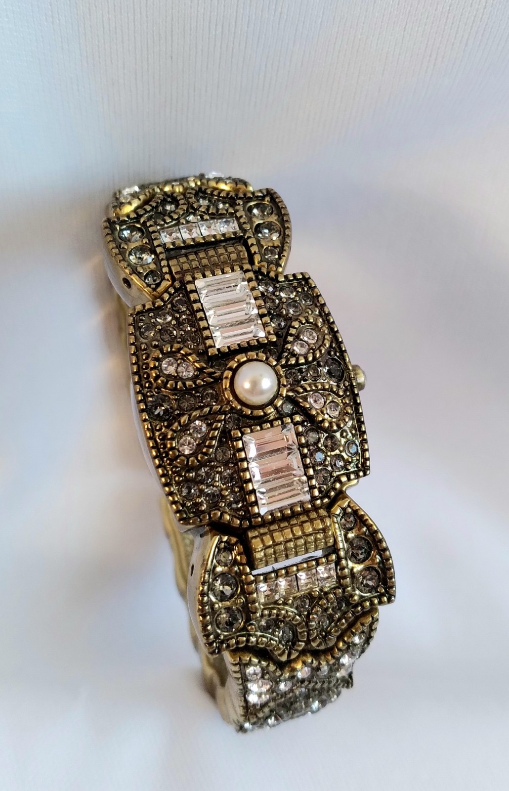 Heidi Daus Art Deco Peek A Boo Wrist Watch Pearl Clear Smokey Crystals Bronze