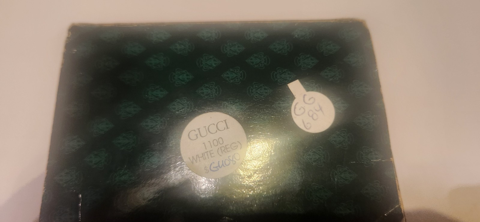 Gucci 1100 Series Interchangeable Bezel Watch (referred to as the Gucci 11/12)