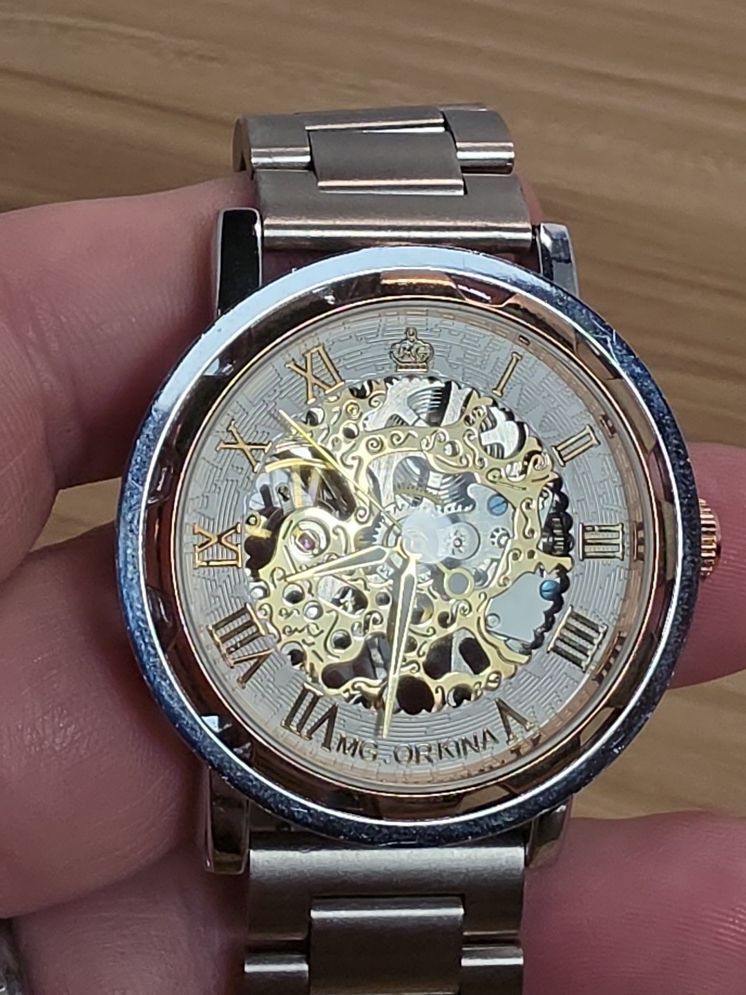 MG ORKINA AUTOMATIC SKELATON GOLD COLORED FACE WATCH WITH Silver BAND
