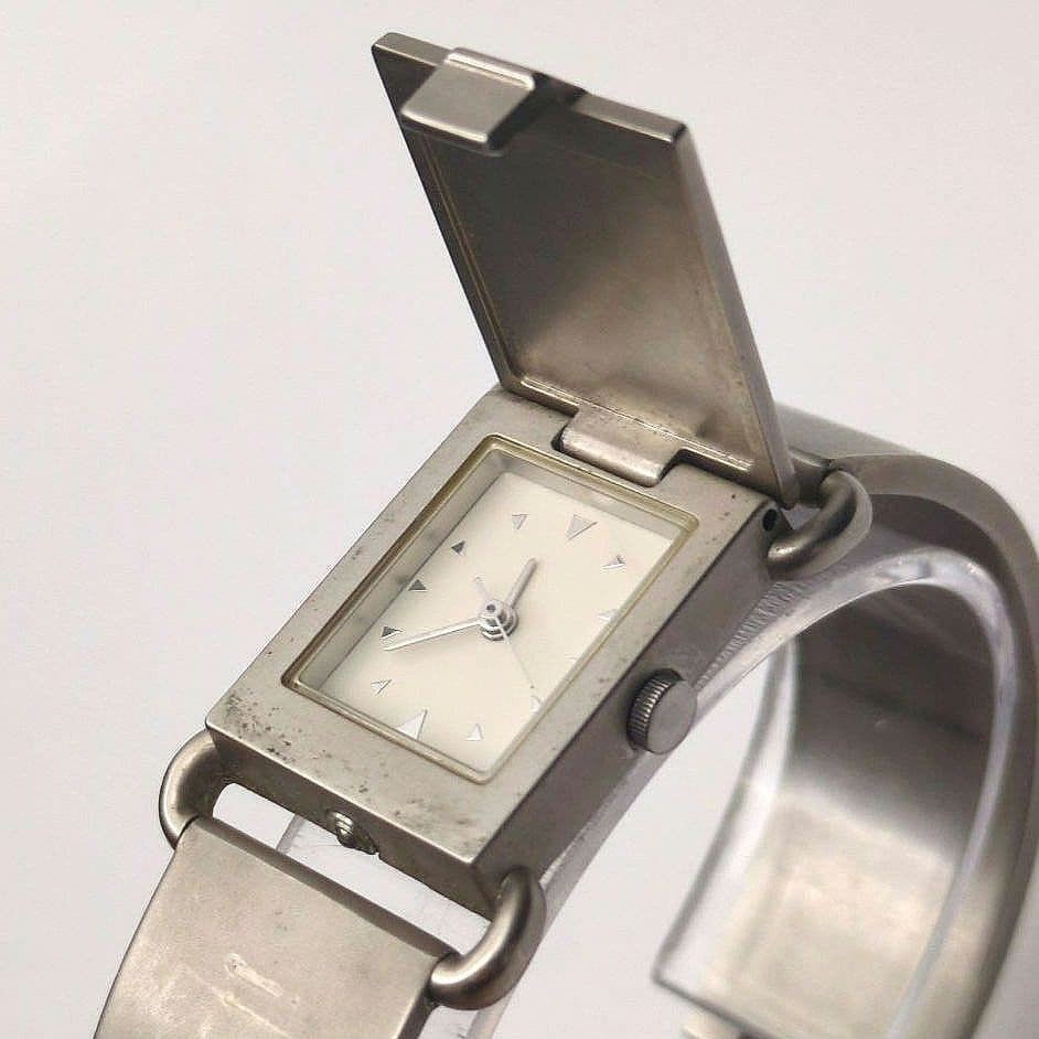 Agnes B. V401-5940 Ladies Quartz Flip-Cover Bangle Watch Silver