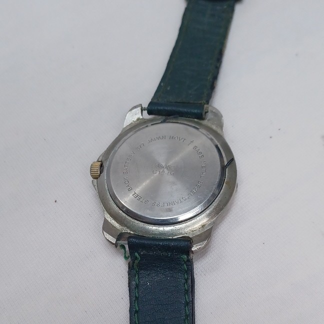 Rustler Quartz Analog Wristwatch Blue Dial Date Silver Case Green Leather Strap