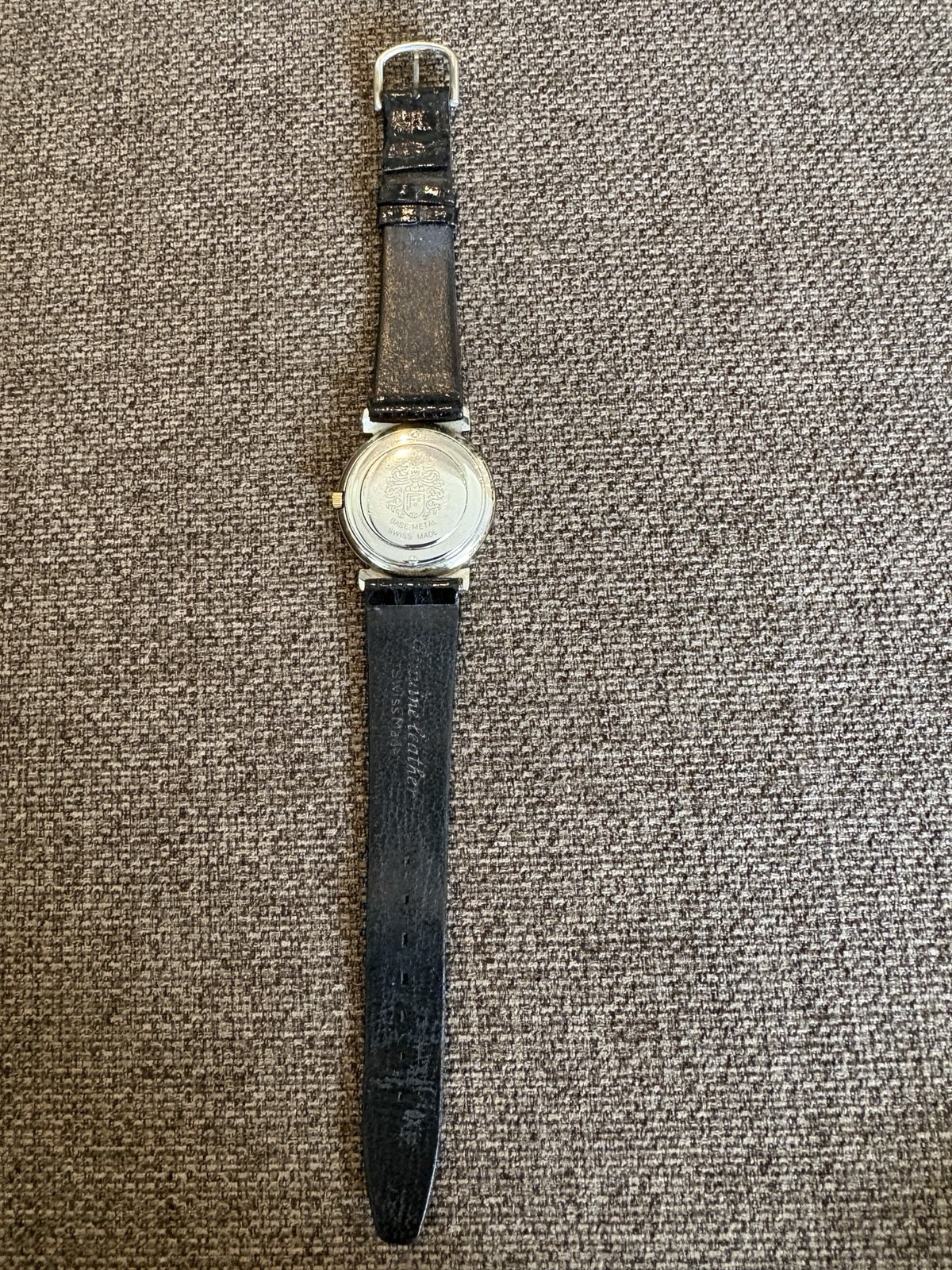 Movado women’s watch. Mother Of Pearl Face. Black Leather Strap