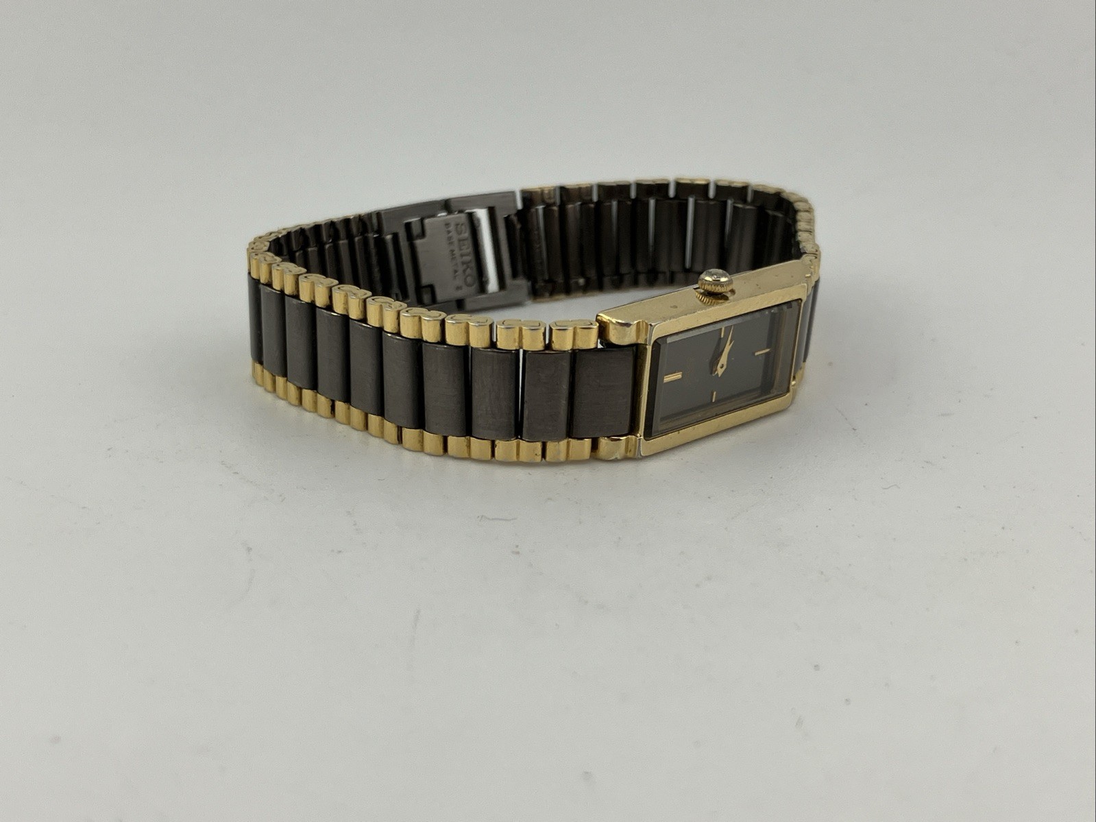 Vtg Seiko Ladies 12mm Watch Gray & Gold Tone Tank Dial 5.75″ 1e20-551h – RUNS