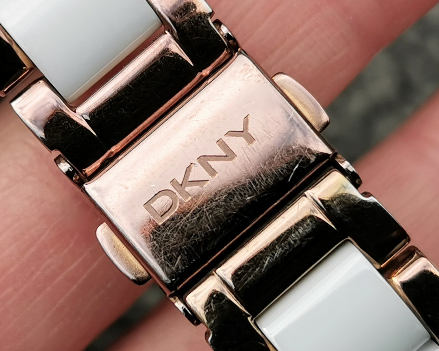 DKNY NY850 Rose Gold Watch, White Round Dial Ceramic Bracelet, Deployment Clasp