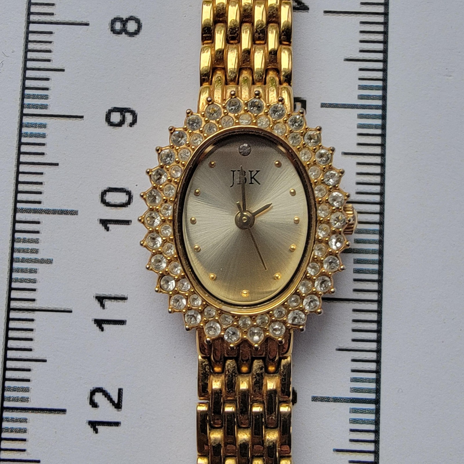 JBK Womens Gold Oval Elegant Dress Watch Gemmed Bracelet Quartz Jewelry Clasp