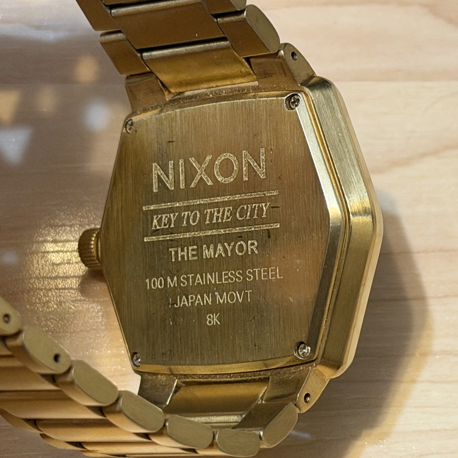 Nixon The Mayor “Key to the City” Gold Brown Hex Surf Analog Silver Men’s Watch