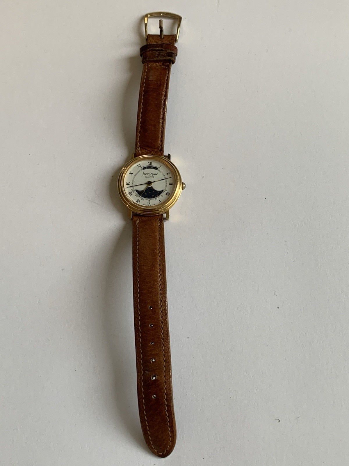 Deux Mille Swiss Made Quartz Watch White Roman Dial. Working-Needs Battery