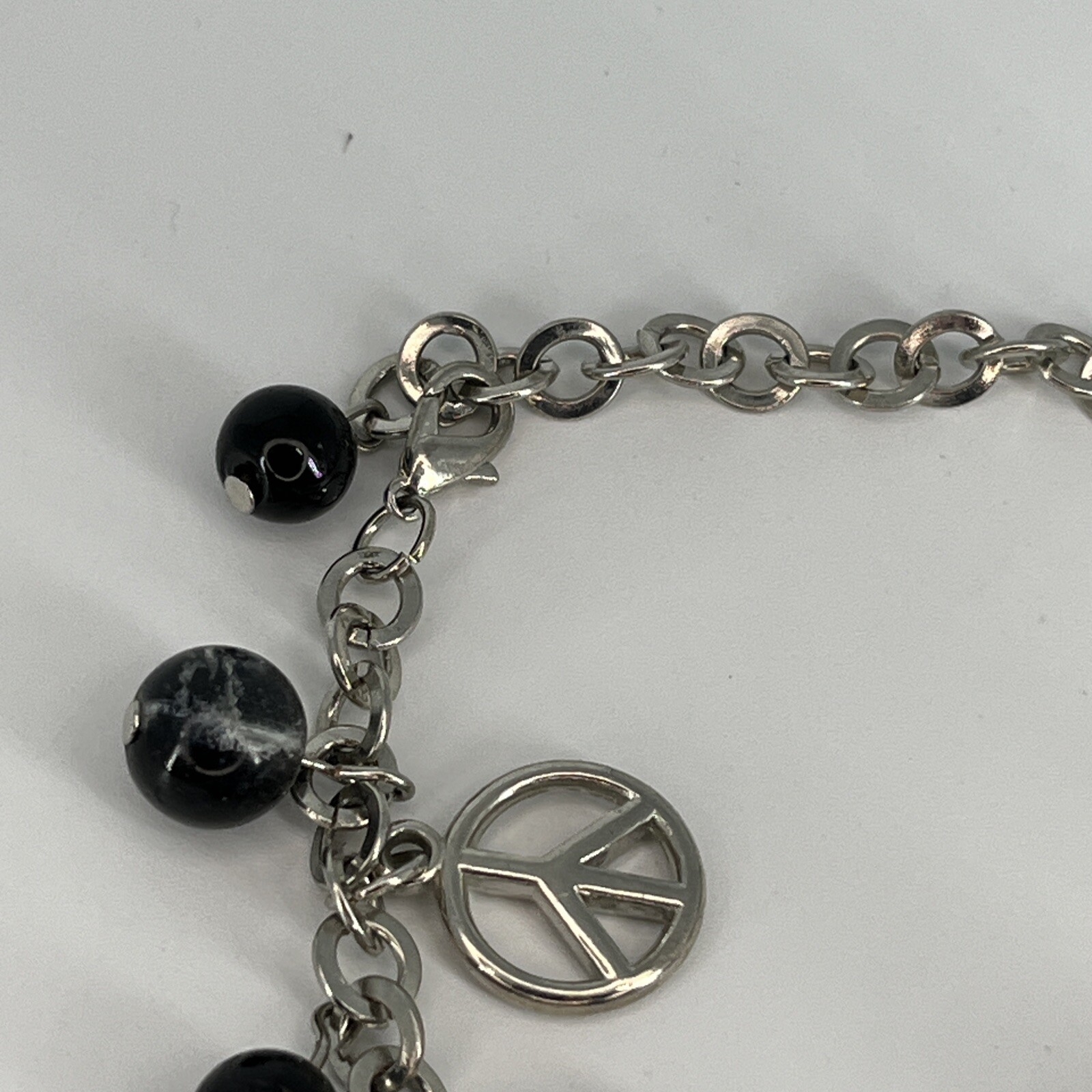 FINESSE Peace Women’s Watch Charm Bracelet Watch Silver Tone NEW BATTERY RUNS!