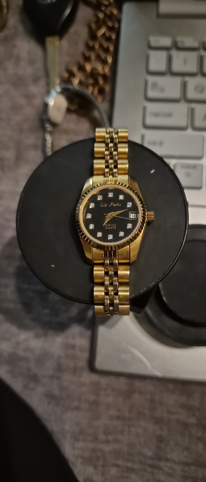 Liz Parks Women’s Gold Black Metal Analog Watch Day Date 22mm