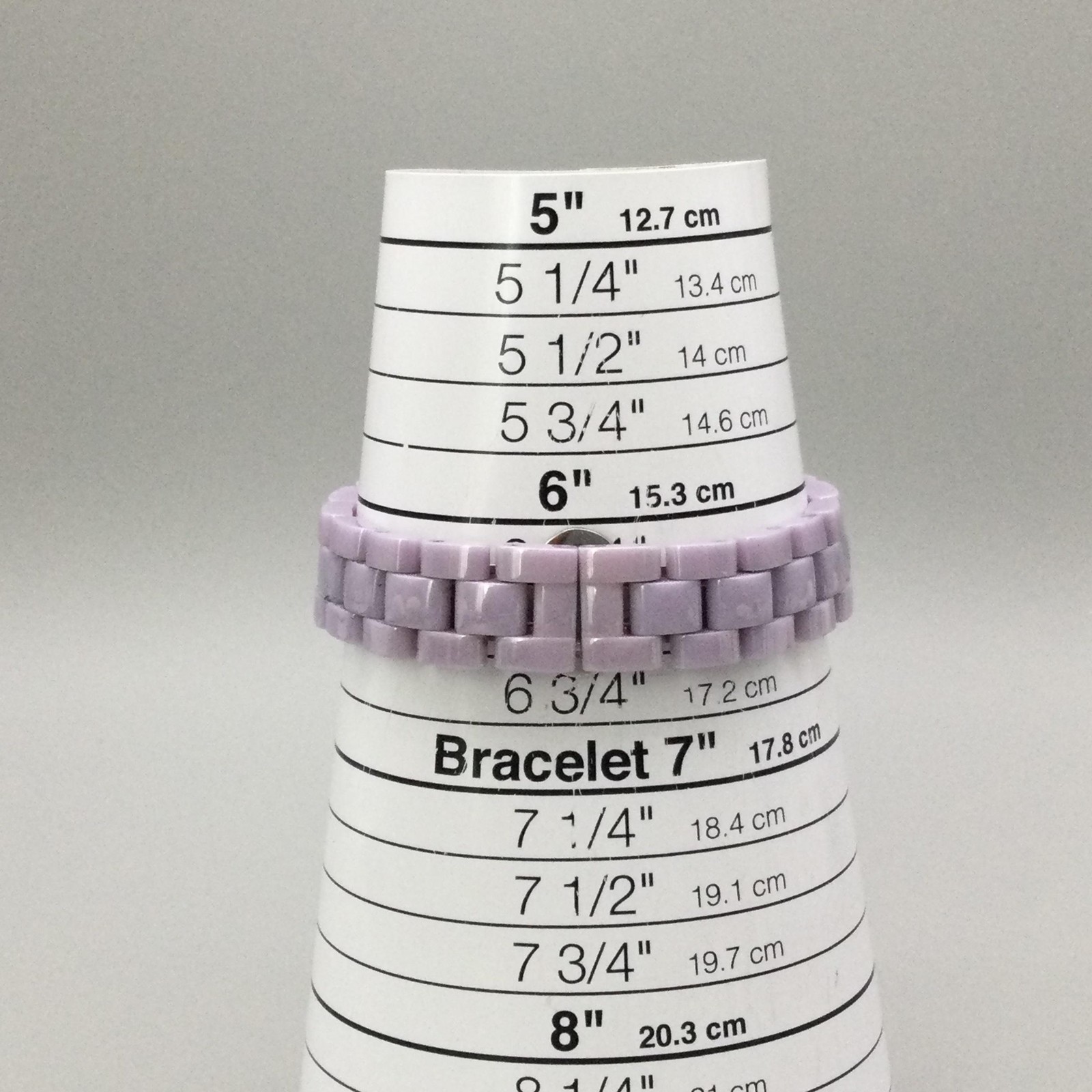 Isaac Mizrahi Live Womens Watch 34mm White MOP Purple Ceramic New Battery 6.5″