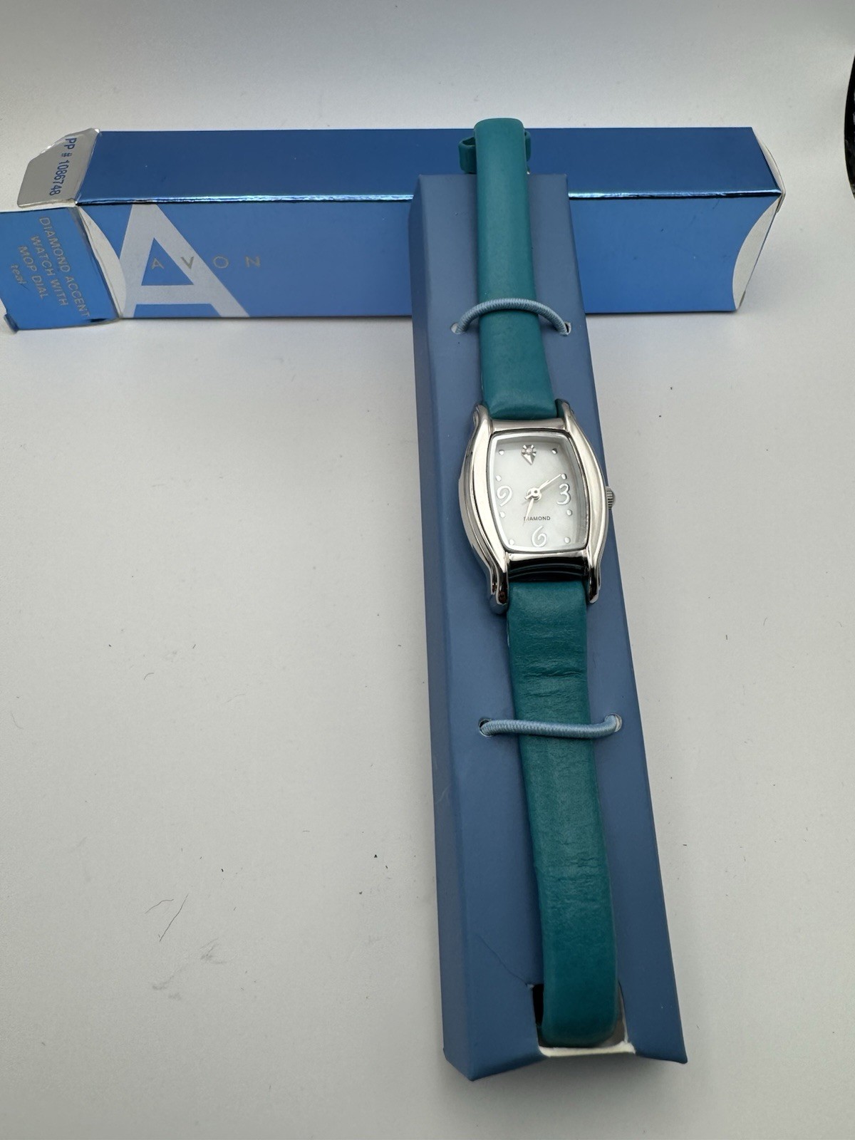 Avon Vintage Diamond Accent Watch With Mother Of Pearl Dial (teal)