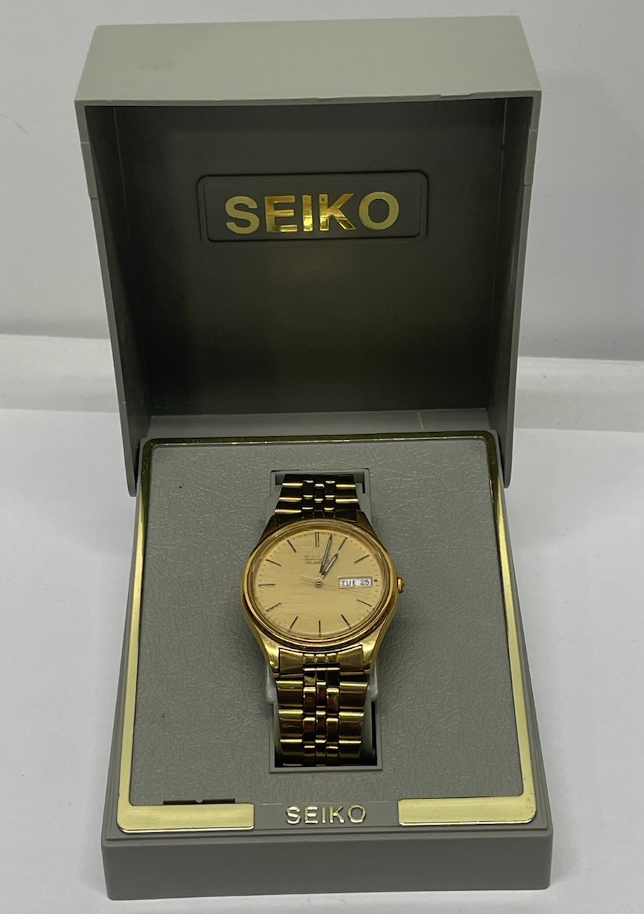 Seiko Watch Men 35mm Champagne Dial Gold Tone Daydate 7N43-8A39 (needs battery)