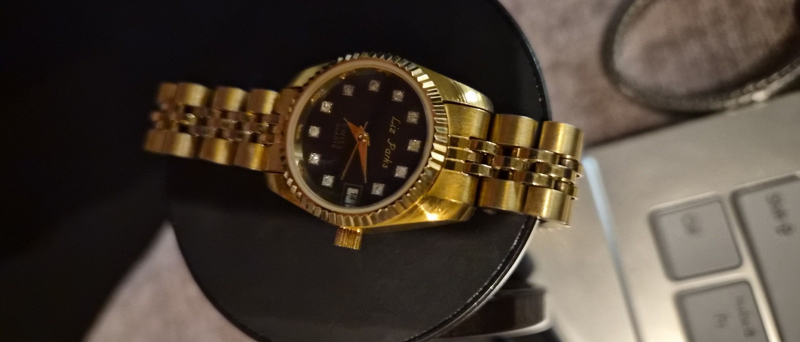 Liz Parks Women’s Gold Black Metal Analog Watch Day Date 22mm