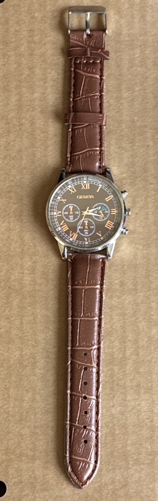 ￼ Geneva Men’s Classic Quartz Watch – Brown Dial, Roman Numerals, Unworn/Working