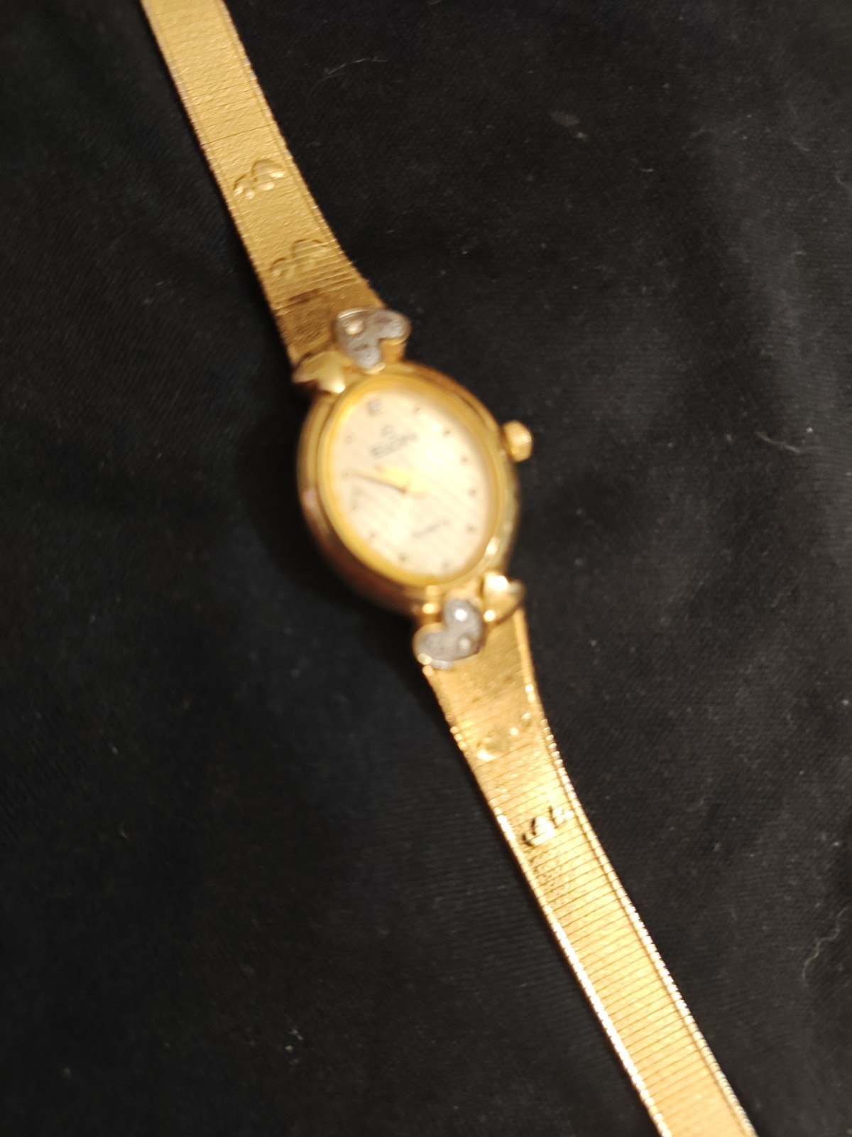 a beautiful antique elgin gold watch with hearts , dainty, oval ,and elegant…