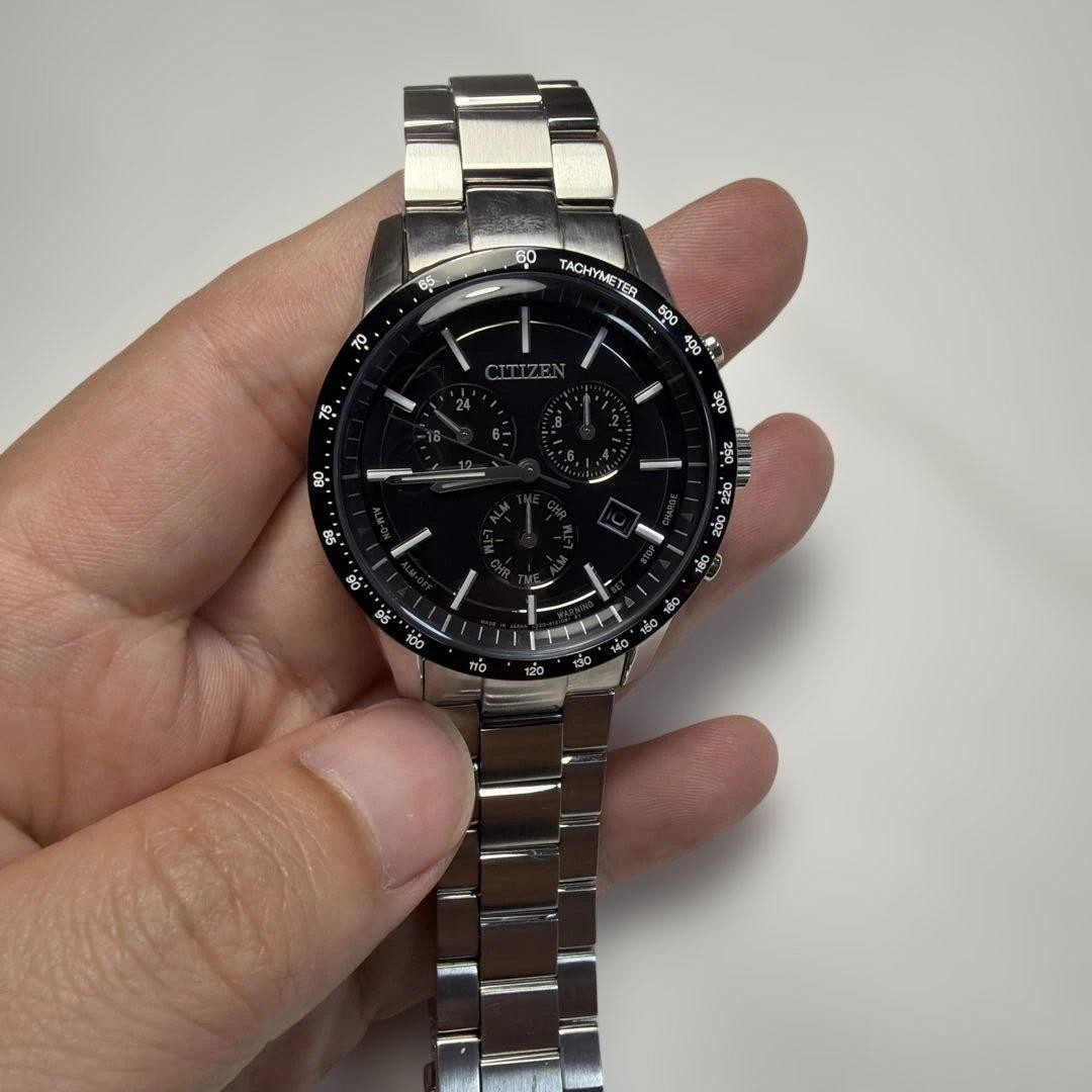 Citizen Eco-Drive E820 Solar Watch Silver Band Black Dial E820-S083460