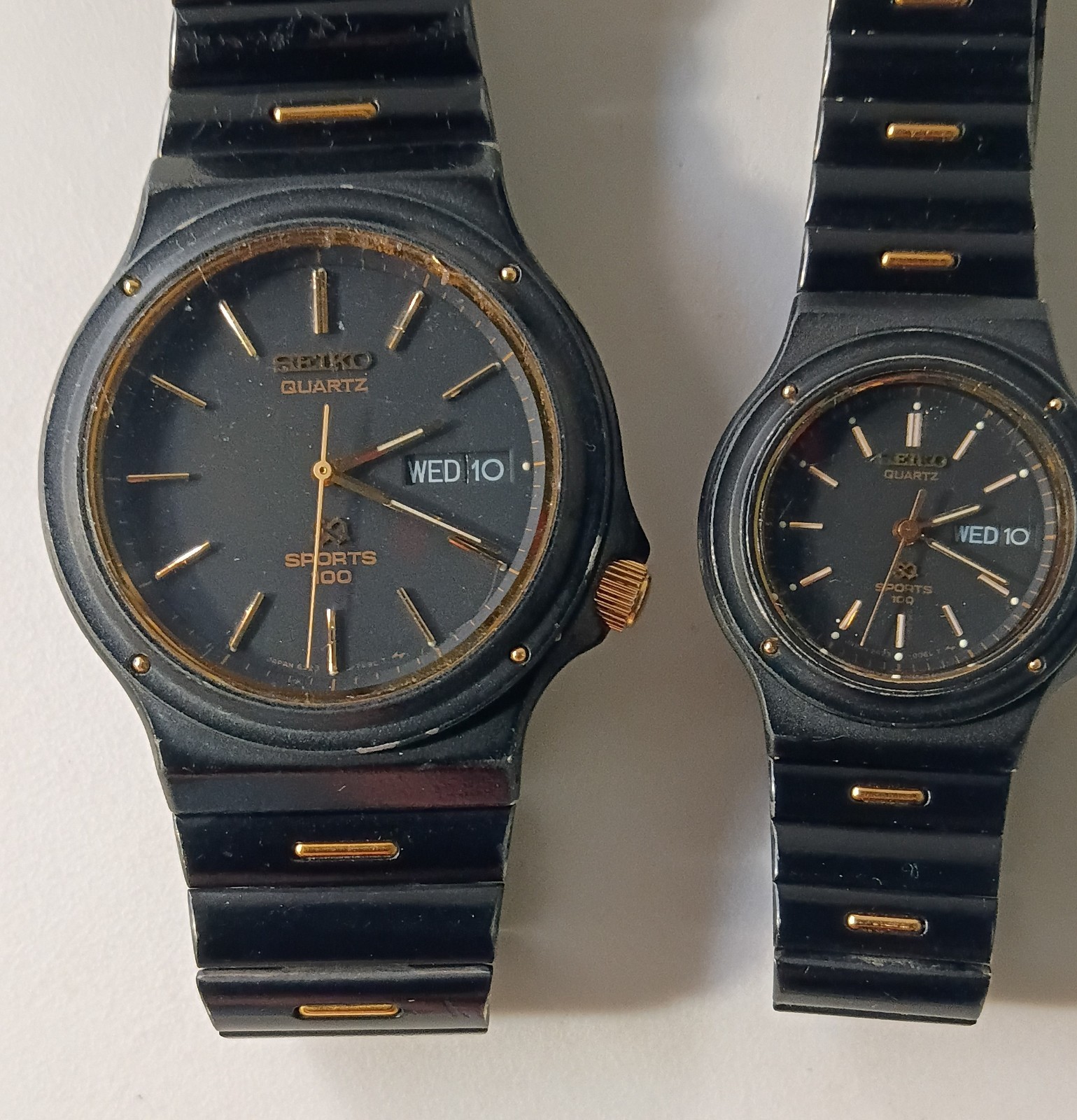 SEIKO SQ SPORTS 100 HIS HERS 1985 WATCH SET BLACK W/ GOLD ACCENTS RUNS GREAT