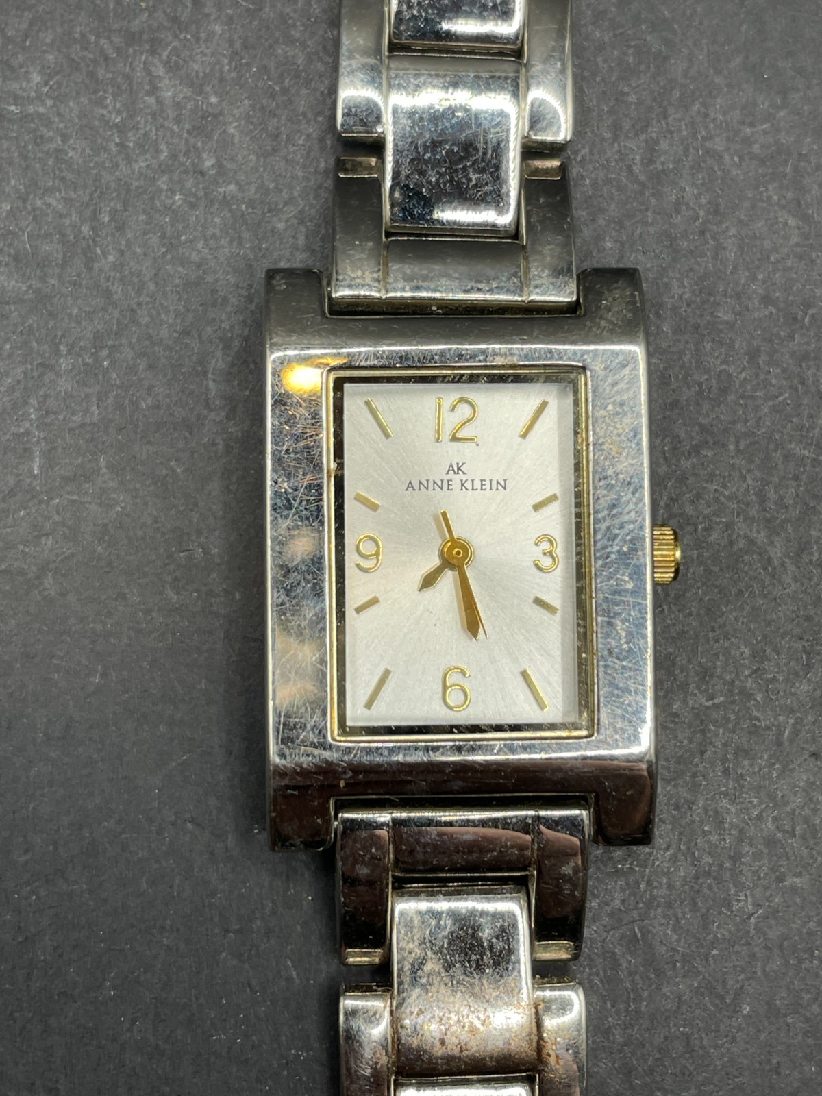 Anne Klein Women’s 10/1409 Silver Dial Gold Accented Quartz Watch 21.5mm 6.5″