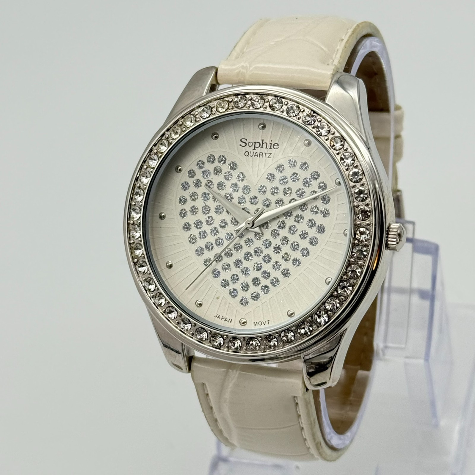 Women’s SOPHIE Silver Tone Crystal Heart Dial Watch, White Band, 45mm, Runs